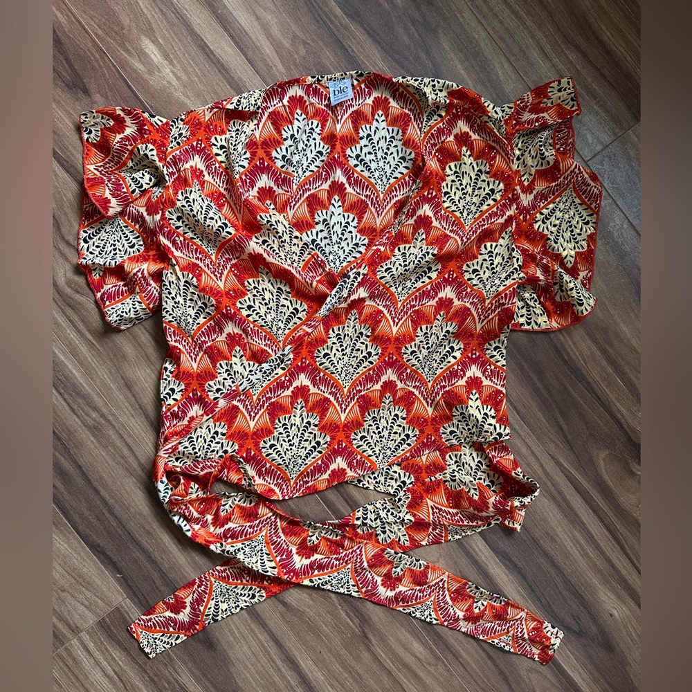 New without tags, Mediterranean orange wrap top, multi-size, bought in Italy